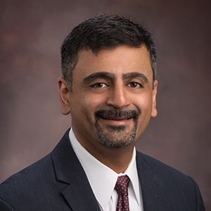 Headshot of Dr. Amit Amin, interventional cardiologist at CIS