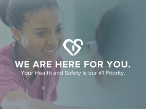 A cardiovascular healthcare professional smiling, with a reassuring message: "we are here for you. Your health and safety is our #1 priority.