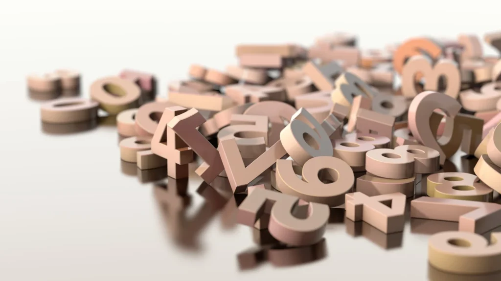A sea of scattered 3d letters in various shades of beige covering a smooth surface, creating a disarray of alphabetic characters related to Cardiology.