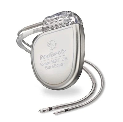A Medtronic pacemaker with leads, designed for MRI compatibility and promoting heart health, isolated on a white background.