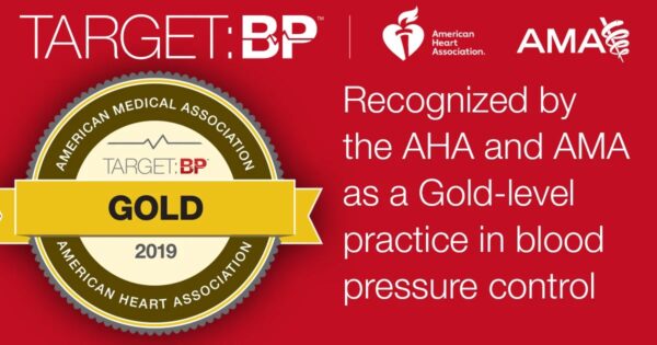 A promotional graphic celebrating a gold-level recognition for blood pressure control achievements, awarded to the Cardiovascular Institute of the South by the American Heart Association (AHA) and the American Medical Association (AMA)