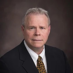 Headshot of the late Michael McElderry, who provided cardiovascular care to the Acadiana community for nearly 30 years