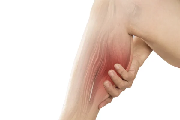 A person experiencing muscle pain in their leg, with a red highlight over the area to indicate discomfort or soreness, prompting concerns about heart health.