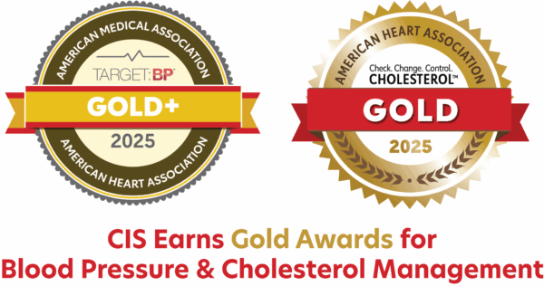 Two gold award badges from the American Heart Association for blood pressure and cholesterol management, labeled for the year 2025.