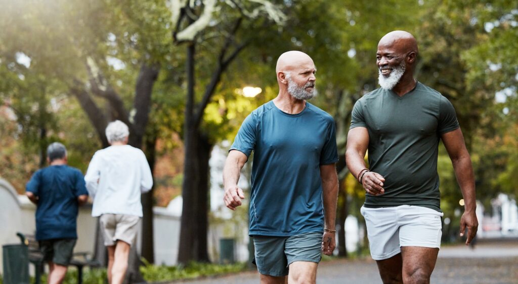 Men walking together in a park for exercise